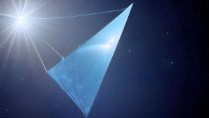 a triangular reflective sail attached to tethers in space in front of a bright distant object