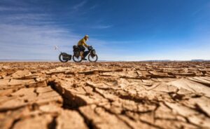 Mateusz Waligora on his bike in the Gobi.