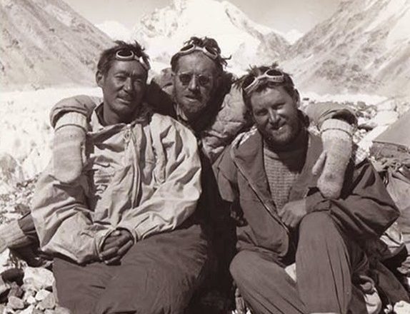 The clibmers in Base Camp, in a black and white image.